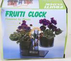 Horloge Fruiti : horloge fonctionne avec plantes fruitières., Enlèvement ou Envoi, Utilisé, Digital, Autres types
