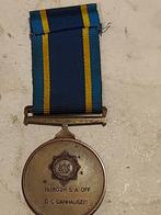 médaille  police Afrique du sud, Enlèvement