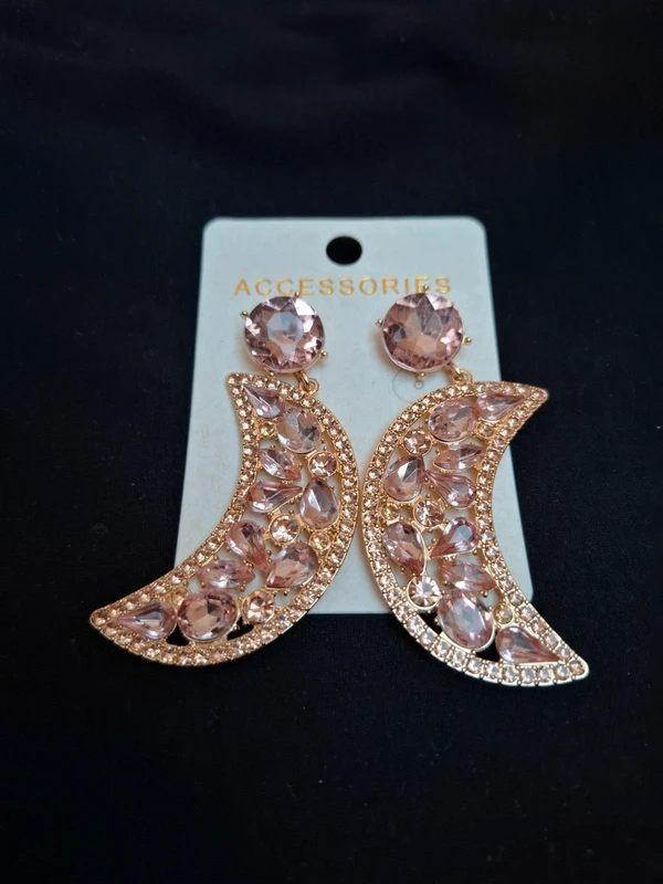 Roze oorbellen met maan, Handtassen en Accessoires, Oorbellen, Overige materialen, Hangers, Nieuw, Ophalen of Verzenden