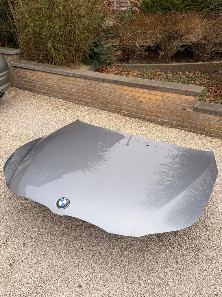 Bmw E60 motorkap aluminiun, Ophalen