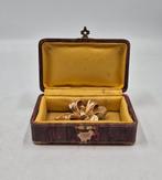Broche uit de jaren 50, Ophalen