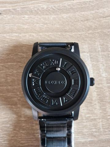 Herenhorloge. Magnetische balletjes. Nieuw.  beschikbaar voor biedingen