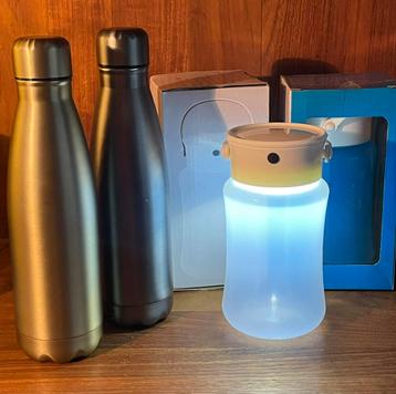 Nieuw 2 drinkbussen / 2 opberg led lampjes beschikbaar voor biedingen