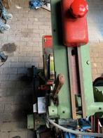 Beugelzaagmachine, Ophalen