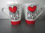 Tassen Keith Haring Dansend hart 2 stuks NIEUW, Huis en Inrichting, Nieuw, Kop(pen) en/of Schotel(s), Ophalen of Verzenden