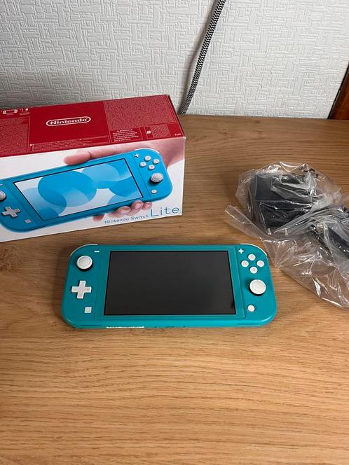 Nintendo Switch Lite blauwe console in doos met oplader, Games en Spelcomputers, Spelcomputers | Nintendo Switch Lite, Zo goed als nieuw