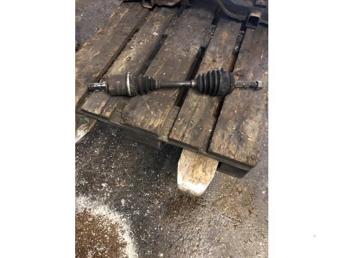 Aandrijfas links-voor van een Opel Corsa, Auto-onderdelen, Remmen en Aandrijving, Opel, Gebruikt, 3 maanden garantie, Ophalen of Verzenden