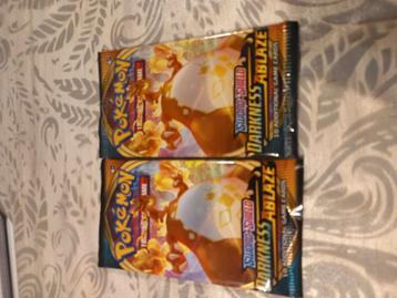 2x Darkness Ablaze booster pack Charizard beschikbaar voor biedingen