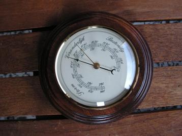 Mooie barometer op houten ring (wandmodel).