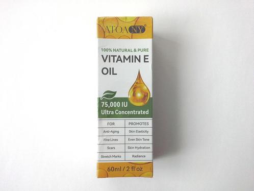 Huile de vitamine E - Flacon neuf scellé de 60 ml, Handtassen en Accessoires, Uiterlijk | Gezichtsverzorging, Nieuw, Verzorging