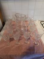 12 wijnglazen en karaf zo goed als nieuw., Antiek en Kunst, Antiek | Glaswerk en Kristal, Ophalen