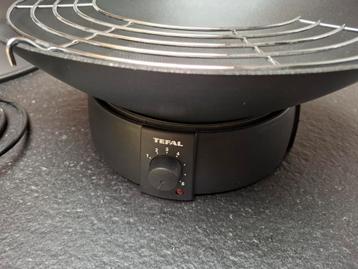 Tefal elektrische wok beschikbaar voor biedingen