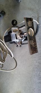 Houtfrees met geleiders, Ophalen