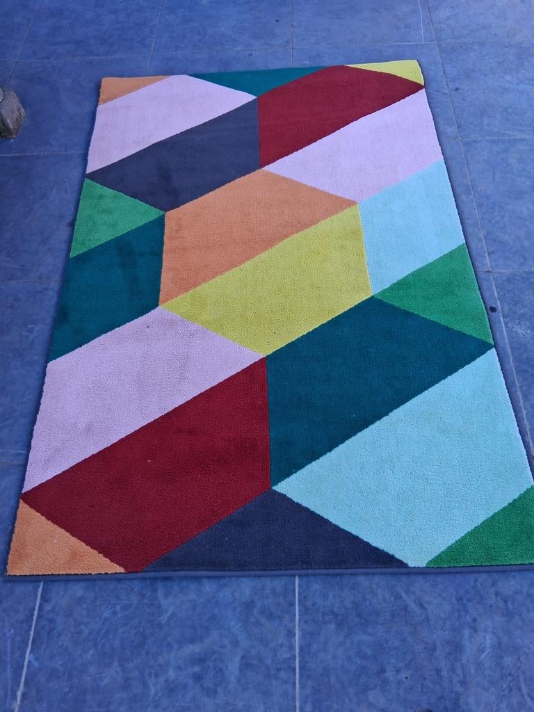 Kleurrijk tapijt, Ophalen