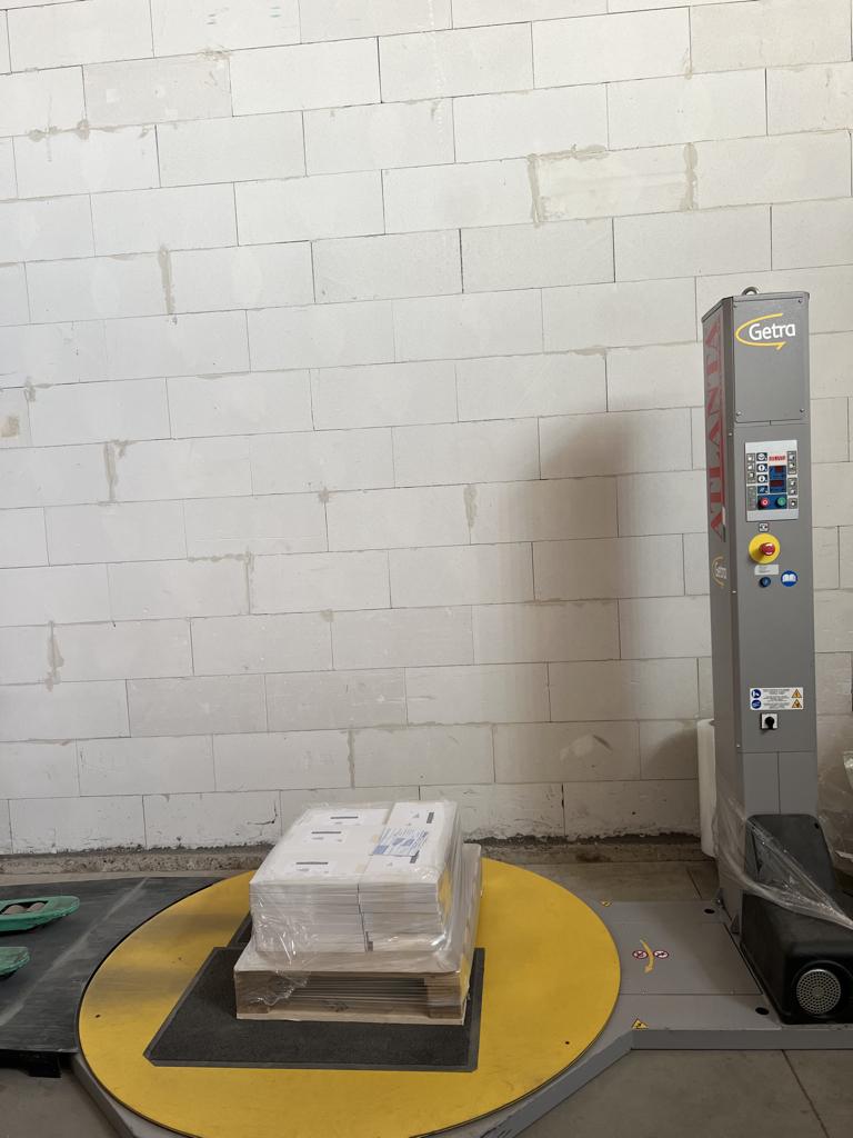 Palletwikkelaar met oprijplaat én 15 rollen folie, Enlèvement