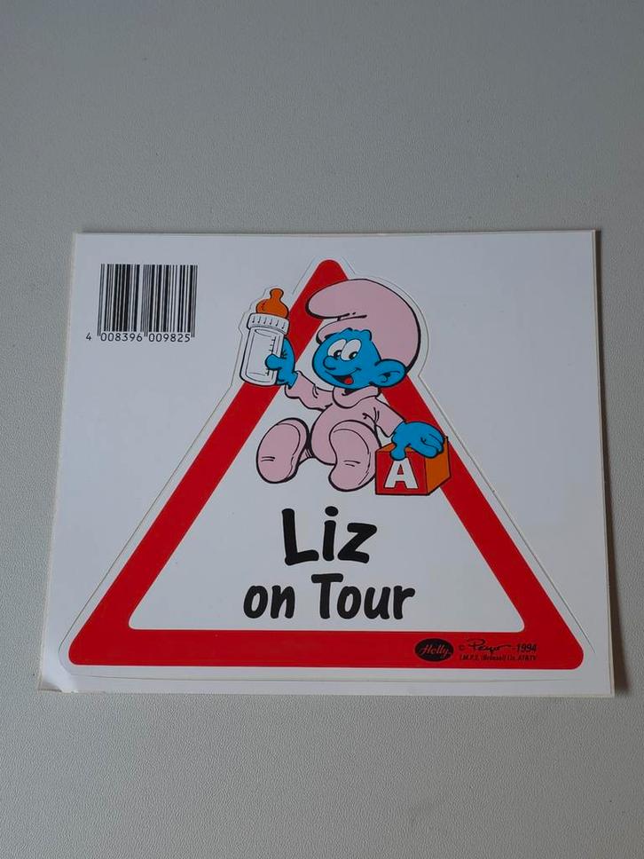 Autocollant Bébé Schtroumpf en voiture Liz, Collections, Schtroumpfs, Comme neuf, Autres types, Bébé Schtroumpf, Envoi