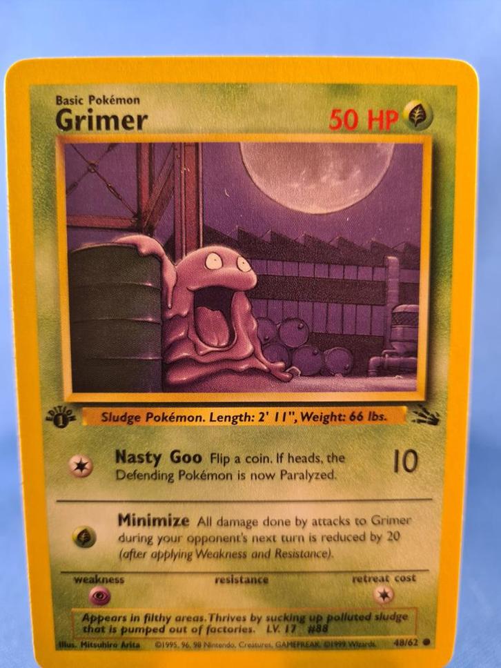 Grimer 48/62 - Fossil (1st edition), Hobby en Vrije tijd, Verzamelkaartspellen | Pokémon, Gebruikt, Verzenden