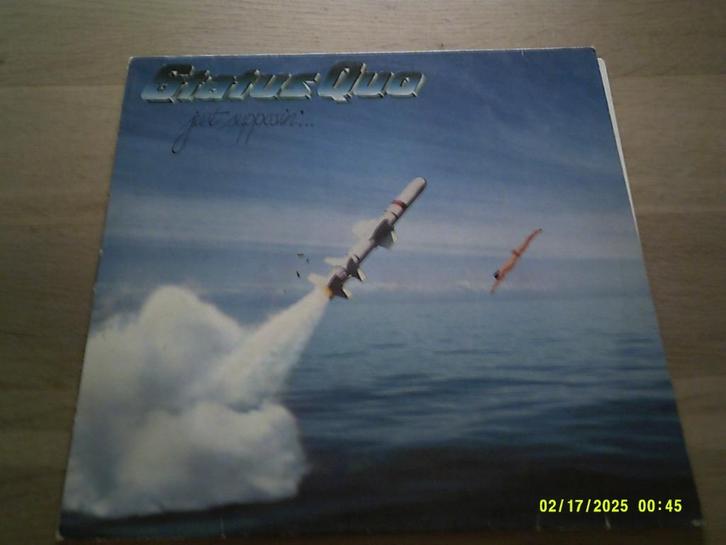 Status Quo-- Just Propossin / Vinyl lp--1980--ZGST, Cd's en Dvd's, Vinyl | Hardrock en Metal, Zo goed als nieuw, Ophalen of Verzenden