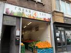Boutique de fruits et légumes, rue animée Rentable