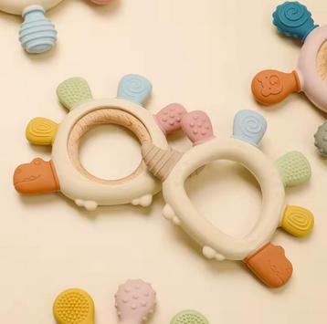 Bijtring dino voor babys met beginnende tandjes beschikbaar voor biedingen