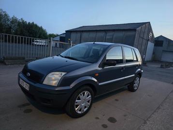 Ford Fusion 1.4i - 06/2005 - airco  beschikbaar voor biedingen