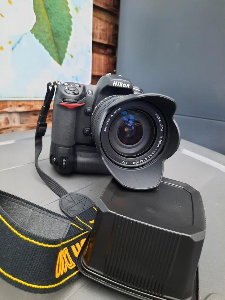 Nikon D300 + grip + lens + batterijen, Audio, Tv en Foto, Fotocamera's Digitaal, Zo goed als nieuw, Spiegelreflex, Nikon, 4 t/m 7 keer