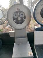 Grote weegschalen, Ophalen