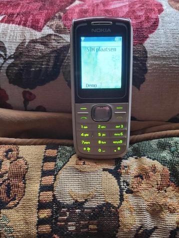 gsm nokia rood/beige disponible aux enchères