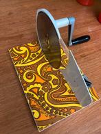 Vintage snijmachine, Ophalen