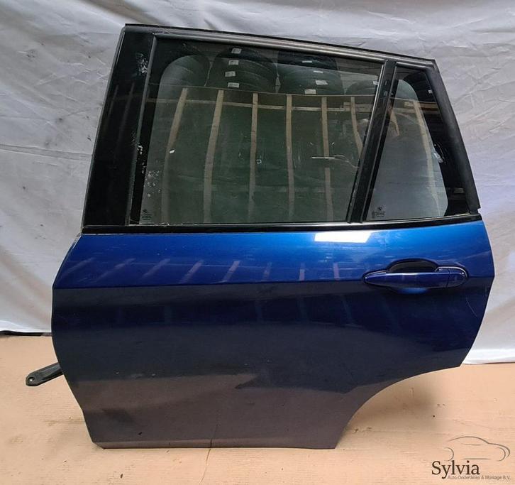 Deur links achter BMW X1 E84 381 Lemans blauw, Auto-onderdelen, Carrosserie, Deur, Gebruikt, Ophalen of Verzenden