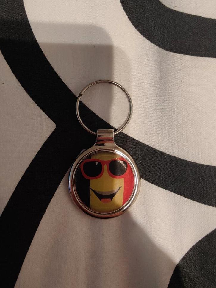 Leuke sleutelhanger met smiley en zonnebril, Verzamelen, Sleutelhangers, Zo goed als nieuw, Stad of Land, Ophalen