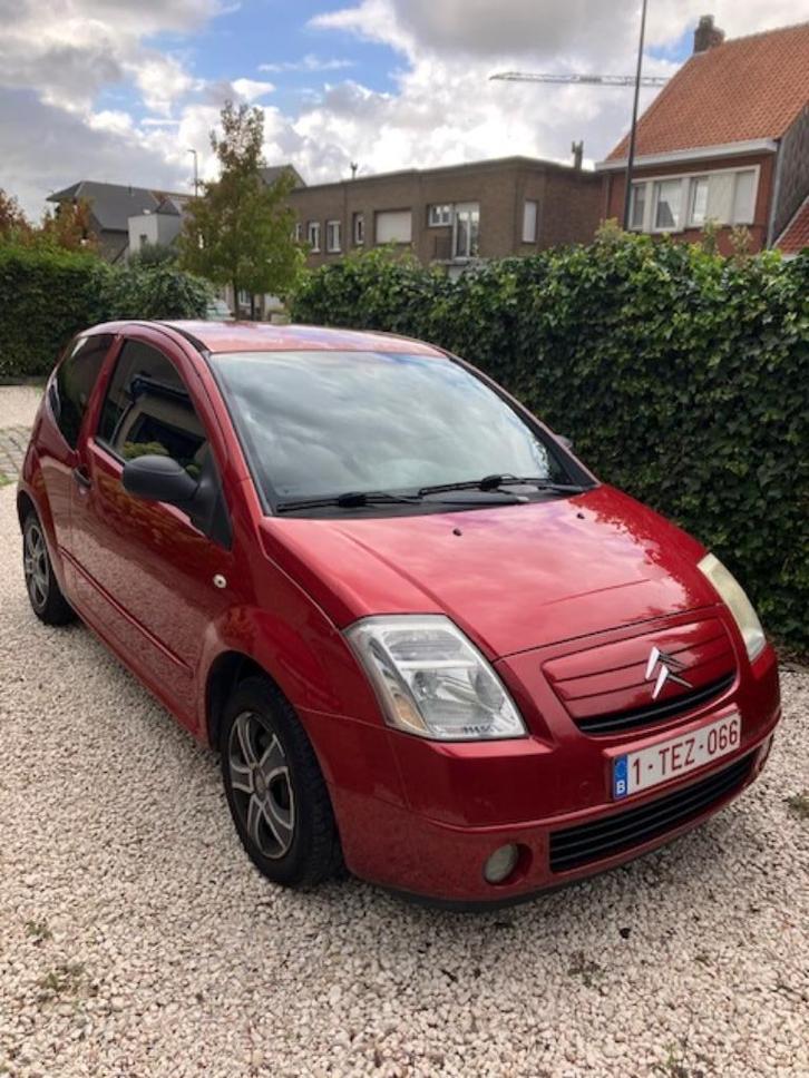 Te koop Citroen C2 bouwjaar 2007, Auto's, Citroën, Particulier, C2, Benzine, Stadsauto, 3 deurs, Handgeschakeld, Rood, Grijs, Stof