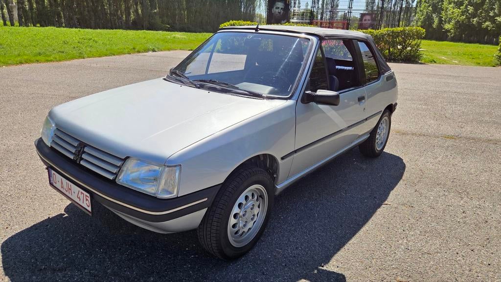 Peugeot 205 cabriolet 1.4 CJ bj92, Autos, Peugeot, Particulier, Essence, Cabriolet, 2 portes, Boîte manuelle, Argent ou Gris, Bleu