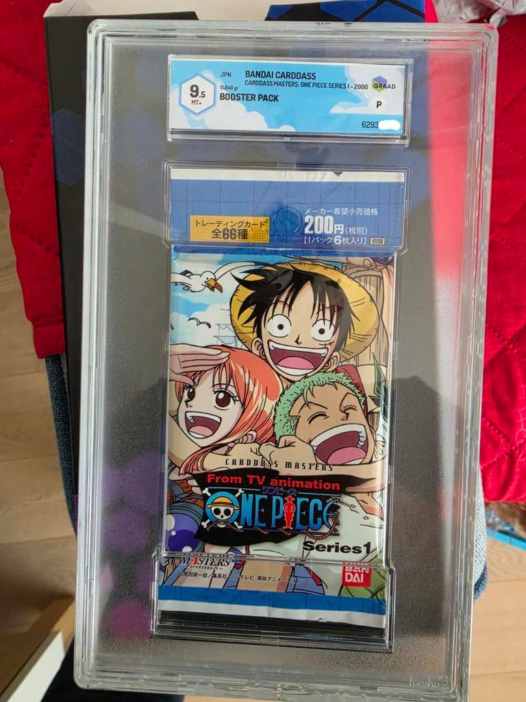 Bandai OnePiece Series 1 Booster Pack Graded, Ophalen of Verzenden, Booster