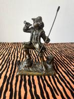 Bronzen beeld., Ophalen