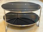 Table ronde avec deux plateaux, Ophalen