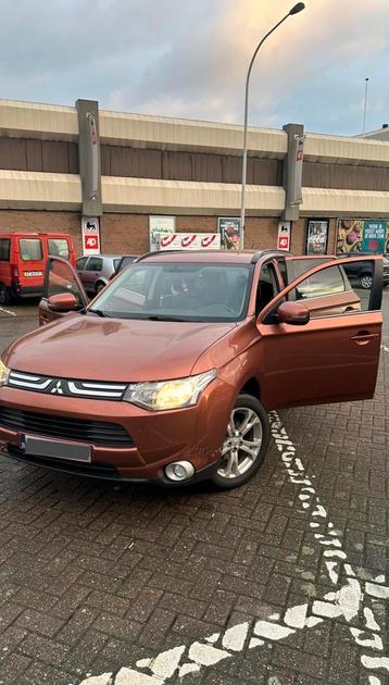 Mitsubishi Outlander 2.2 2012, Auto's, Mitsubishi, Euro 5, Outlander, Zwart, Bedrijf
