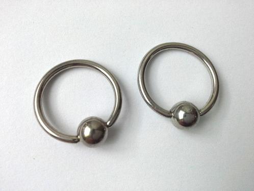 2 anneaux pour piercings en acier chirurgical 1.6 x 18 mm, Handtassen en Accessoires, Piercings, Gebruikt, Staal, Ophalen of Verzenden
