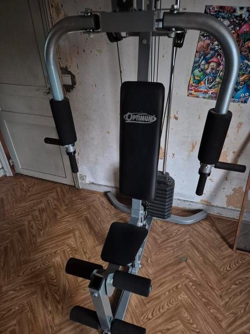 Station de musculation Optimum (40 kg environ), Sport en Fitness, Fitnessapparatuur, Gebruikt, Overige typen, Armen, Benen, Borst