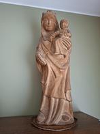 Groot stenen beeld, vrouw met kind, Ophalen