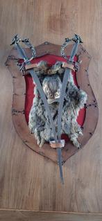 Wapenschild met zwaarden, Ophalen