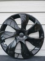 Enjoliveur tesla, Ophalen