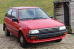 Toyota Starlet 52.000 km, Auto's, Stof, Zwart, 4 cilinders, Starlet