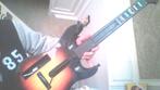 Guitare vintage du jeu  Guitar hero, Enlèvement