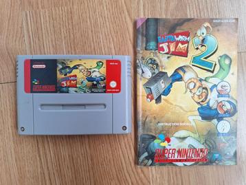 EarthWorm Jim 2 + handleiding voor de Super Nintendo (SNES) beschikbaar voor biedingen