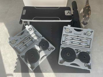 Fitness bankje en gewichten beschikbaar voor biedingen