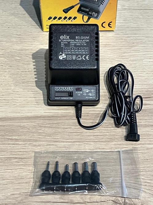 NIEUW : Universele Regelbare Voeding 3 - 12 Volt - 33% !!, Hobby en Vrije tijd, Elektronica-componenten, Nieuw, Ophalen of Verzenden