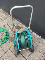 Gardenaslang op haspel, Ophalen, Zo goed als nieuw