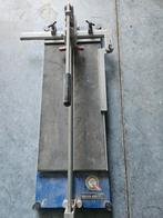 Tegelsnijder, Ophalen