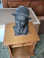 statuette de mineur sur son socle